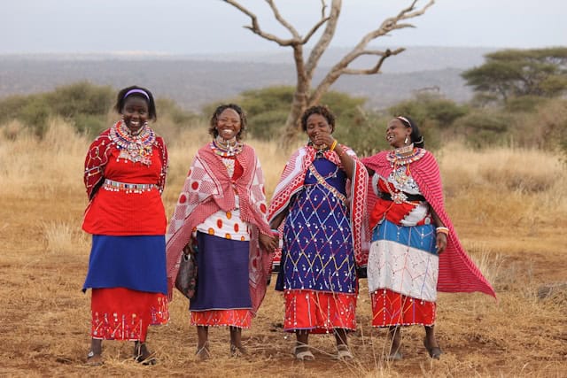 A group of Maasai women wearing traditional attires, Amboseli, Kenya
