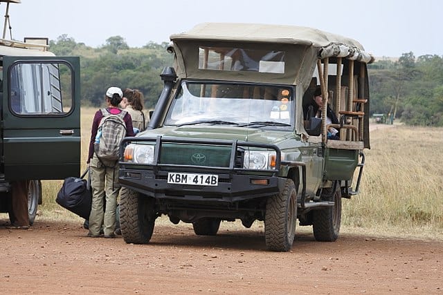 Tourists boarding a Safari Land Cruiser in Kenya